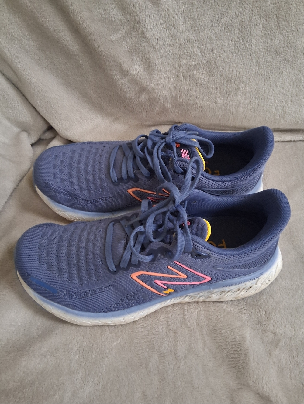 New Balance Purple Running Shoes with Pink and Yellow Accents